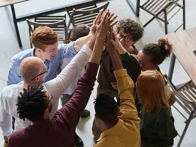 A team working together around a table